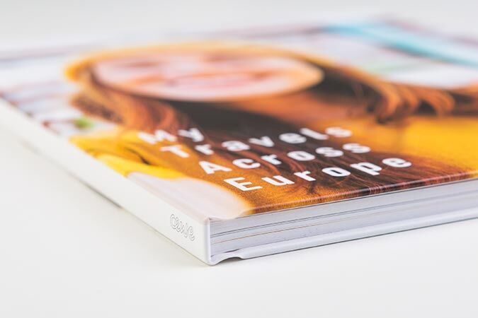 Wunderschönes CEWE FOTOBUCH mit Fotocollage auf dem Cover