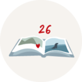 Offenes CEWE FOTOBUCH mit einer Herz-Dekoration auf einer Seite und der Zahl 26 darüber