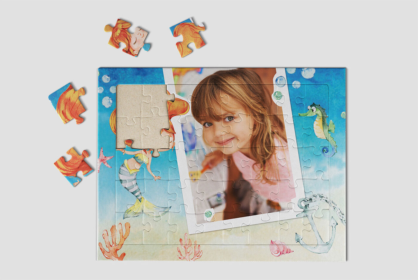 Completed puzzle with maritime motifs and one missing piece, some puzzle pieces lie next to it